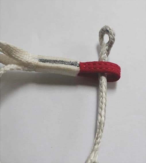 3. Pass the dyneema line through the red chest strap loop.