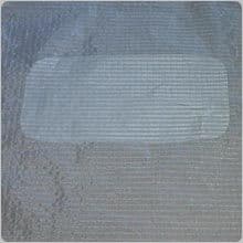 The finished repair. On a large tear like this you should stick a repair patch on both sides.