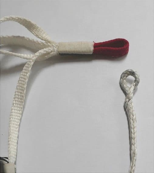 2. Remove the ABS loop from the red chest strap loop (undo the lark's head knot).