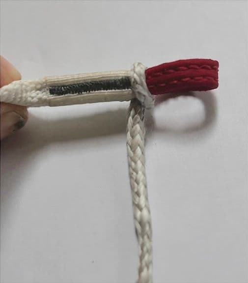 6. Tighten-up the dyneema ABS loop around the red chest strap loop.