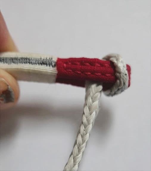 5. Push the dyneema ABS loop all the way to the beginning of the red chest strap loop.